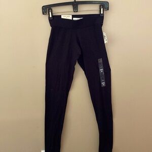 Never worn classic black leggings sized XS